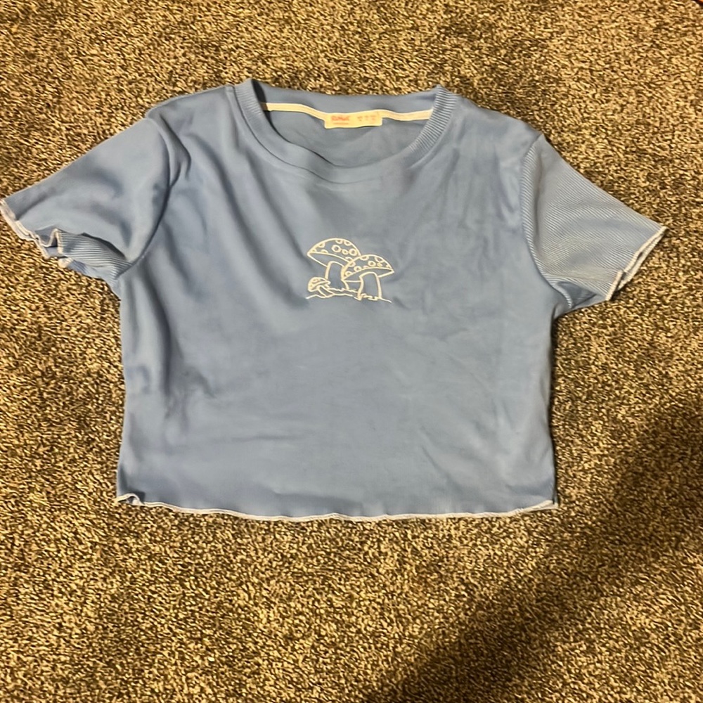 Blue shirt with mushroom embroidery